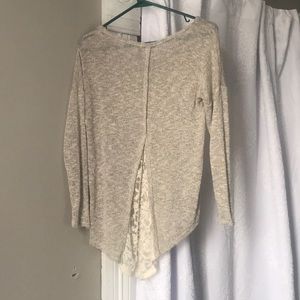Tan light weight sweater with lace on the back